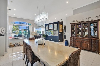 This spacious 1-story home offers serene water views from nearly on Woodmont Country Club in Florida - for sale on GolfHomes.com, golf home, golf lot