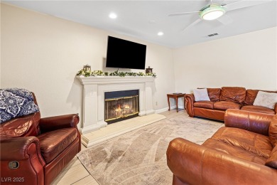 This stunning two-story residence offers 5 spacious bedrooms and on Painted Desert Golf Club in Nevada - for sale on GolfHomes.com, golf home, golf lot