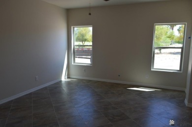 USDA zero down eligible new construction Santa Fe Style home in on The Links At Coyote Wash in Arizona - for sale on GolfHomes.com, golf home, golf lot