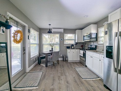 Whether looking for a winter retreat or a full-time residence on The Great Outdoors Golf and Country Club in Florida - for sale on GolfHomes.com, golf home, golf lot