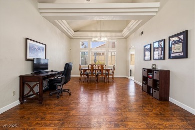 This stunning two-story residence offers 5 spacious bedrooms and on Painted Desert Golf Club in Nevada - for sale on GolfHomes.com, golf home, golf lot