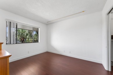 Wake up to tranquil lake and golf course views in this on Fountains Golf and Country Club in Florida - for sale on GolfHomes.com, golf home, golf lot