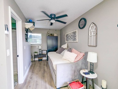 Whether looking for a winter retreat or a full-time residence on The Great Outdoors Golf and Country Club in Florida - for sale on GolfHomes.com, golf home, golf lot