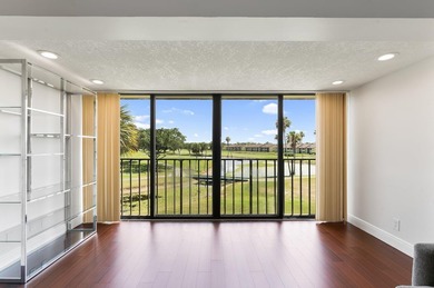 Wake up to tranquil lake and golf course views in this on Fountains Golf and Country Club in Florida - for sale on GolfHomes.com, golf home, golf lot