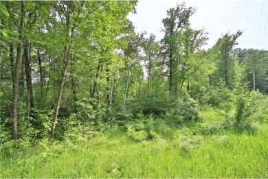 Enjoy the best of the Northwoods on this half-acre wooded lot on Hardwoods Golf Club At Mille Lacs in Minnesota - for sale on GolfHomes.com, golf home, golf lot