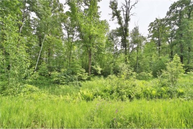 Enjoy the best of the Northwoods on this half-acre wooded lot on Hardwoods Golf Club At Mille Lacs in Minnesota - for sale on GolfHomes.com, golf home, golf lot