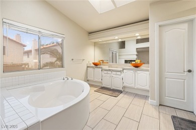 This stunning two-story residence offers 5 spacious bedrooms and on Painted Desert Golf Club in Nevada - for sale on GolfHomes.com, golf home, golf lot