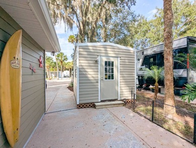 Whether looking for a winter retreat or a full-time residence on The Great Outdoors Golf and Country Club in Florida - for sale on GolfHomes.com, golf home, golf lot