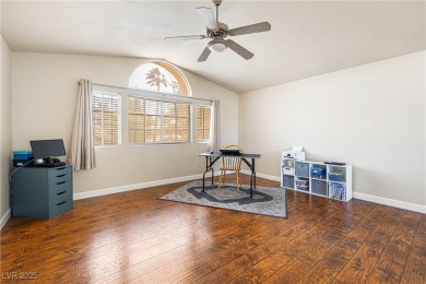 This stunning two-story residence offers 5 spacious bedrooms and on Painted Desert Golf Club in Nevada - for sale on GolfHomes.com, golf home, golf lot