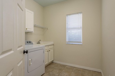 Set behind the gates of Harbor Links, one of Westchase most on Westchase Golf Club in Florida - for sale on GolfHomes.com, golf home, golf lot