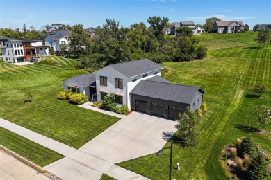 Custom designed 1.5 story contemporary is nestled in Estates on on Echo Valley Country Club in Iowa - for sale on GolfHomes.com, golf home, golf lot