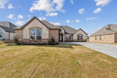 Experience executive living in the prestigious, guarded on Pecan Plantation Country Club in Texas - for sale on GolfHomes.com, golf home, golf lot