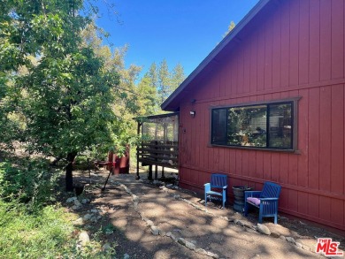 Here is a family-friendly dream home in the mountains! Nestled on Pine Mountain Club in California - for sale on GolfHomes.com, golf home, golf lot