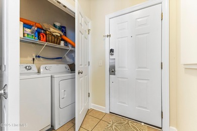 Discover easy coastal living in this spacious condo located in on Sea Trail Golf Resort in North Carolina - for sale on GolfHomes.com, golf home, golf lot