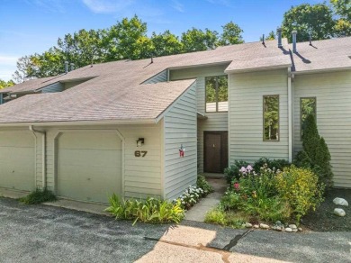 Welcome to 1185 Hideaway Valley Drive, Unit #67, a charming on Little Traverse Bay Golf Club and Restaurant in Michigan - for sale on GolfHomes.com, golf home, golf lot