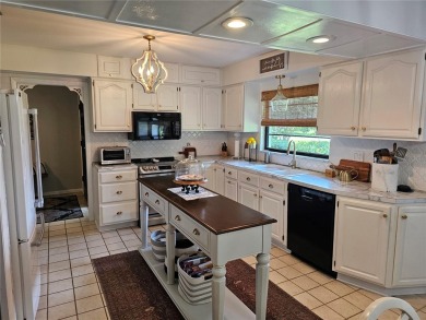 **Charming 3-Bedroom Home in Gated Cypresswood Community** 

 on Cypresswood Golf and Country Club in Florida - for sale on GolfHomes.com, golf home, golf lot