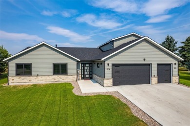 Welcome home to this three bedroom property in Ronan located on on Mission Mountain Country Club in Montana - for sale on GolfHomes.com, golf home, golf lot