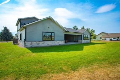 Welcome home to this three bedroom property in Ronan located on on Mission Mountain Country Club in Montana - for sale on GolfHomes.com, golf home, golf lot