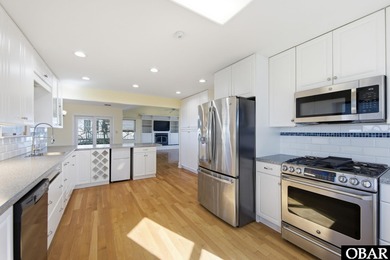 6005 S North Shore Ct sits in the Village at Nags Head, a on Nags Head Golf Links in North Carolina - for sale on GolfHomes.com, golf home, golf lot