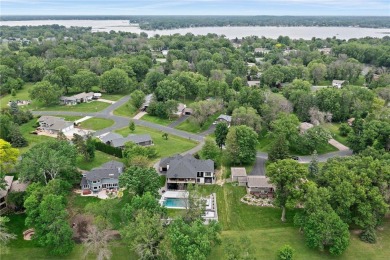 Welcome to this exceptional executive-style residence, perfectly on Forest Hills Golf Club in Minnesota - for sale on GolfHomes.com, golf home, golf lot