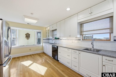 6005 S North Shore Ct sits in the Village at Nags Head, a on Nags Head Golf Links in North Carolina - for sale on GolfHomes.com, golf home, golf lot