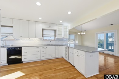 6005 S North Shore Ct sits in the Village at Nags Head, a on Nags Head Golf Links in North Carolina - for sale on GolfHomes.com, golf home, golf lot