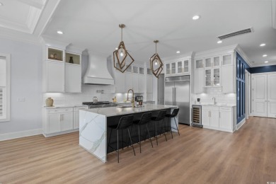 Welcome to 496 West Palms, a breathtaking waterfront sanctuary on Myrtlewood Golf Course and Club  in South Carolina - for sale on GolfHomes.com, golf home, golf lot