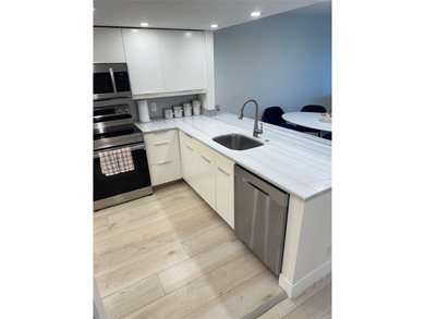 DO NOT MISS THE OPPORTUNITY TO PURCHASE THIS PHENOMENAL PROPERTY on Palm-Aire Country Club and Resort - The Oaks in Florida - for sale on GolfHomes.com, golf home, golf lot