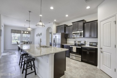Welcome to this stunning and furnished 4-bedroom, 3-bathroom on LPGA International Golf Course in Florida - for sale on GolfHomes.com, golf home, golf lot
