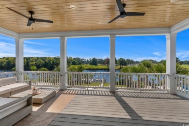Welcome to 496 West Palms, a breathtaking waterfront sanctuary on Myrtlewood Golf Course and Club  in South Carolina - for sale on GolfHomes.com, golf home, golf lot
