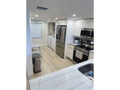 DO NOT MISS THE OPPORTUNITY TO PURCHASE THIS PHENOMENAL PROPERTY on Palm-Aire Country Club and Resort - The Oaks in Florida - for sale on GolfHomes.com, golf home, golf lot