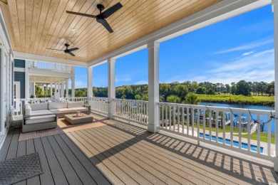 Welcome to 496 West Palms, a breathtaking waterfront sanctuary on Myrtlewood Golf Course and Club  in South Carolina - for sale on GolfHomes.com, golf home, golf lot