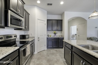Welcome to this stunning and furnished 4-bedroom, 3-bathroom on LPGA International Golf Course in Florida - for sale on GolfHomes.com, golf home, golf lot