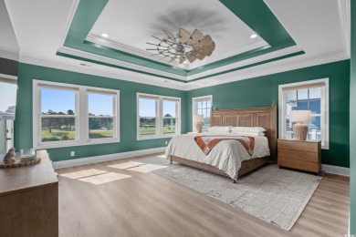 Welcome to 496 West Palms, a breathtaking waterfront sanctuary on Myrtlewood Golf Course and Club  in South Carolina - for sale on GolfHomes.com, golf home, golf lot