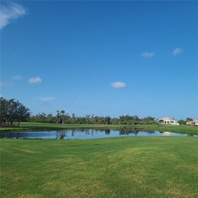 What a view!  Both golf course and lake view will be yours to on Rotonda Golf and Country Club The Links Course in Florida - for sale on GolfHomes.com, golf home, golf lot