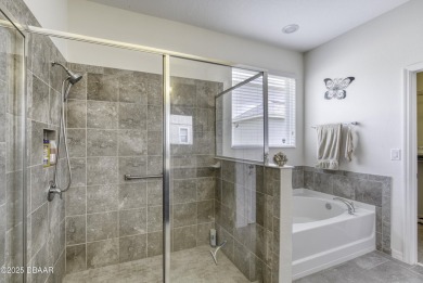 Welcome to this stunning and furnished 4-bedroom, 3-bathroom on LPGA International Golf Course in Florida - for sale on GolfHomes.com, golf home, golf lot