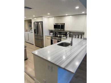 DO NOT MISS THE OPPORTUNITY TO PURCHASE THIS PHENOMENAL PROPERTY on Palm-Aire Country Club and Resort - The Oaks in Florida - for sale on GolfHomes.com, golf home, golf lot