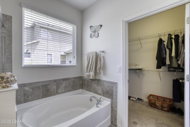 Welcome to this stunning and furnished 4-bedroom, 3-bathroom on LPGA International Golf Course in Florida - for sale on GolfHomes.com, golf home, golf lot