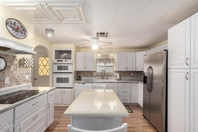 Welcome to this beautifully laid-out 2 bedroom, 2 bathroom home on Sun Lakes Country Club in Arizona - for sale on GolfHomes.com, golf home, golf lot