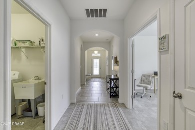 Welcome to this stunning and furnished 4-bedroom, 3-bathroom on LPGA International Golf Course in Florida - for sale on GolfHomes.com, golf home, golf lot