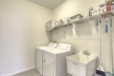 Welcome to this stunning and furnished 4-bedroom, 3-bathroom on LPGA International Golf Course in Florida - for sale on GolfHomes.com, golf home, golf lot