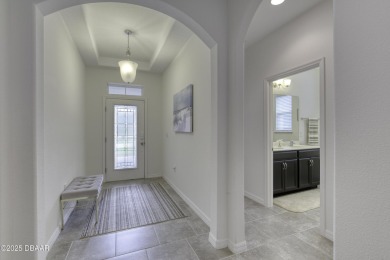 Welcome to this stunning and furnished 4-bedroom, 3-bathroom on LPGA International Golf Course in Florida - for sale on GolfHomes.com, golf home, golf lot