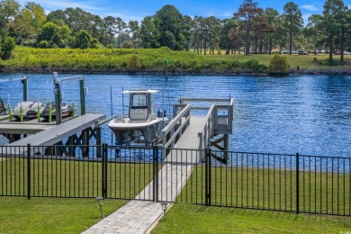 Welcome to 496 West Palms, a breathtaking waterfront sanctuary on Myrtlewood Golf Course and Club  in South Carolina - for sale on GolfHomes.com, golf home, golf lot