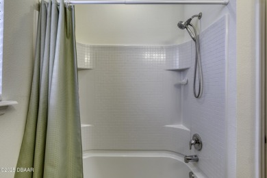 Welcome to this stunning and furnished 4-bedroom, 3-bathroom on LPGA International Golf Course in Florida - for sale on GolfHomes.com, golf home, golf lot