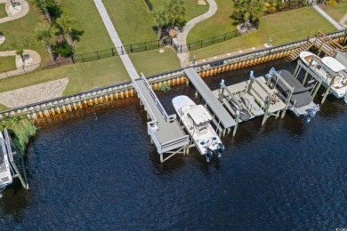 Welcome to 496 West Palms, a breathtaking waterfront sanctuary on Myrtlewood Golf Course and Club  in South Carolina - for sale on GolfHomes.com, golf home, golf lot