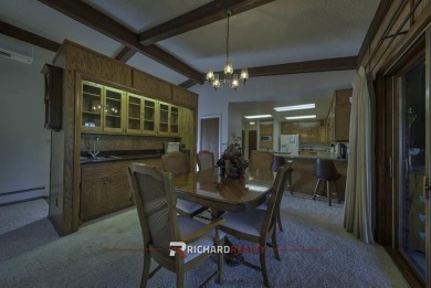 Step into this charming, expansive one-story brick home nestled on Olive Glenn Golf and Country Club in Wyoming - for sale on GolfHomes.com, golf home, golf lot