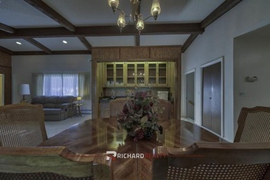 Step into this charming, expansive one-story brick home nestled on Olive Glenn Golf and Country Club in Wyoming - for sale on GolfHomes.com, golf home, golf lot