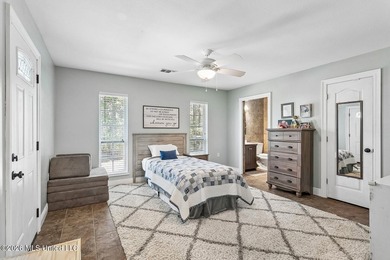 Situated on a spacious double lot in the desirable Diamondhead on Diamondhead Country Club in Mississippi - for sale on GolfHomes.com, golf home, golf lot