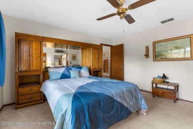 Welcome home to this charming and METICULOUSLY maintained on Oak Hills Country Club in Florida - for sale on GolfHomes.com, golf home, golf lot