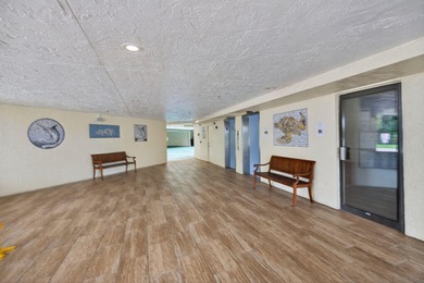 Experience island living at its finest! This spacious 2/2 condo on Ocean Club At the Hutchinson Island Beach Resort in Florida - for sale on GolfHomes.com, golf home, golf lot